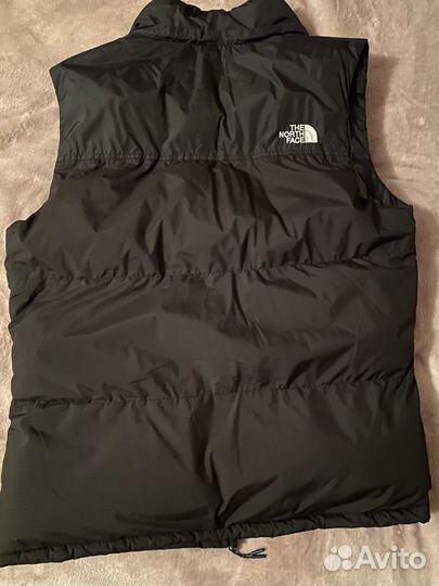 The north face жилетка