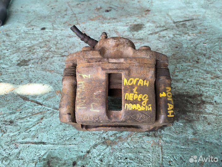 Суппорт тормозной передний правый Renault Logan