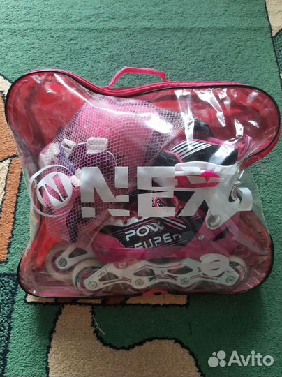 Роликовые коньки