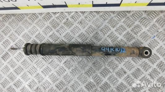 Амортизатор задней балки nissan note E11 (94K10LX0