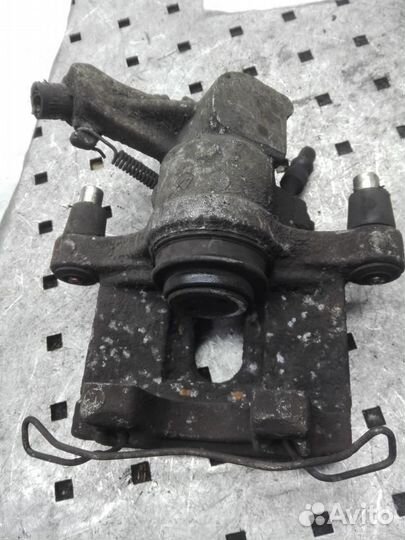 Суппорт задний правый Opel Vectra C