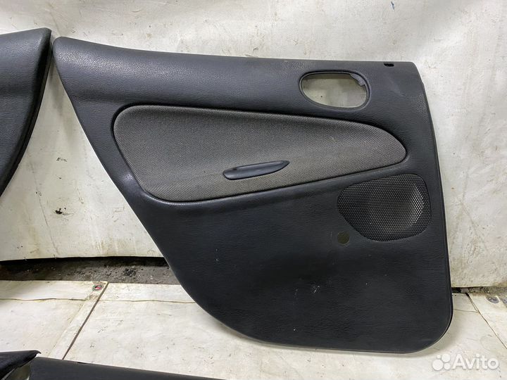 Дверные карты Peugeot 206