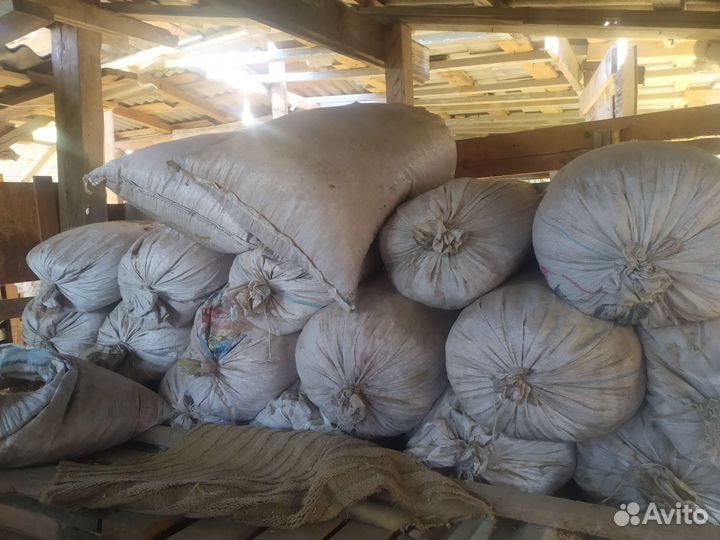 Опилки в мешках