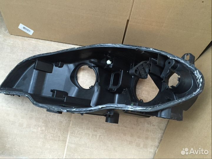 Корпус левой фары BMW X5 E70