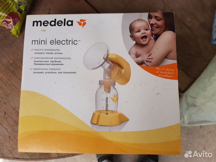 Молокоотсос medela электрический