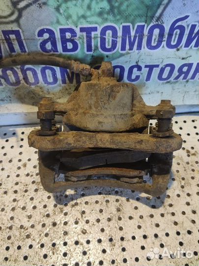 Суппорт тормозной передний левый Hyundai Elantra