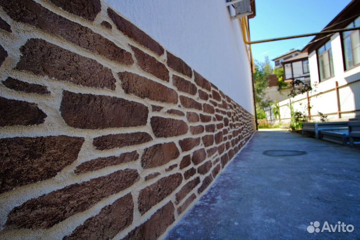 Декоративная штукатурка фасада под камень