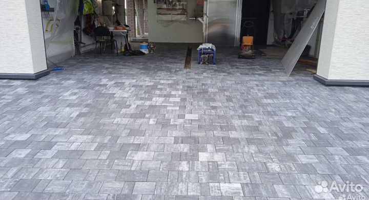 Укладка тротуарной плитки брусчатки