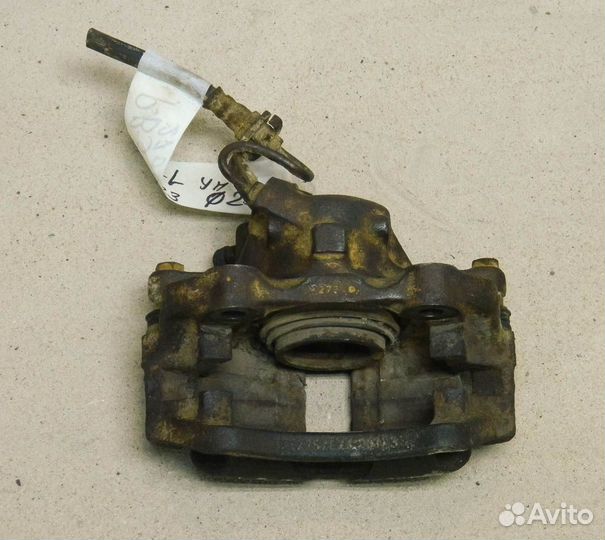 Суппорт передний левый VW Passat B3 1.8