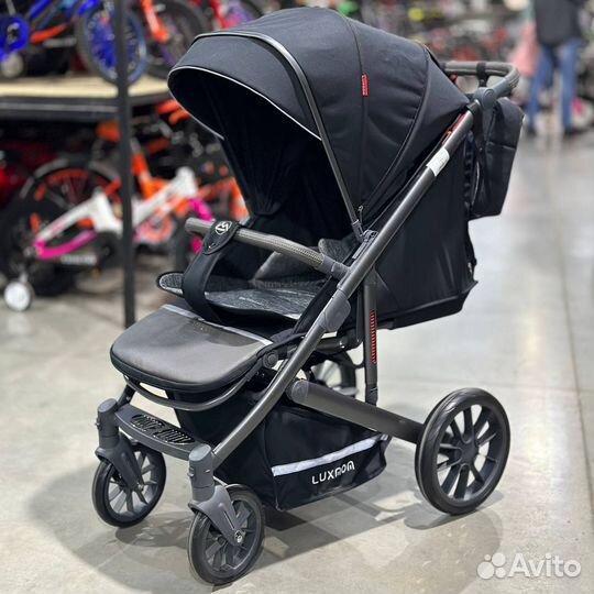Прогулочная коляска новая