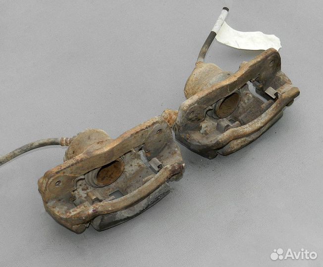 Суппорт передний левый Kia Spectra