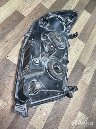 Фара левая Toyota Land Cruiser 100