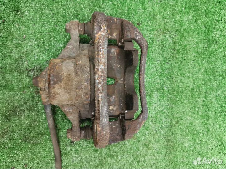 Суппорт тормозной передний правый Kia Ceed хетчбэк