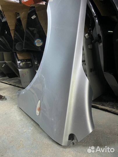 Крыло левое переднее Mitsubishi lancer 10