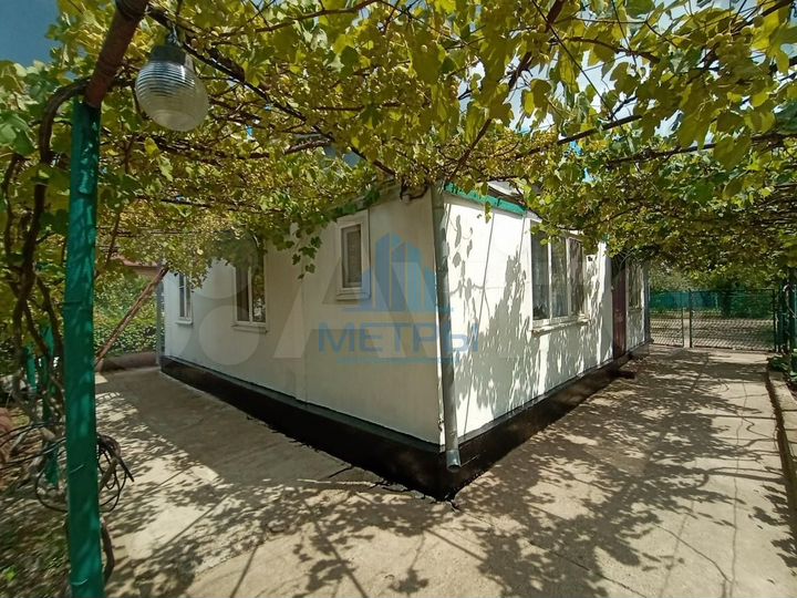 Дом 57 м² на участке 7 сот.