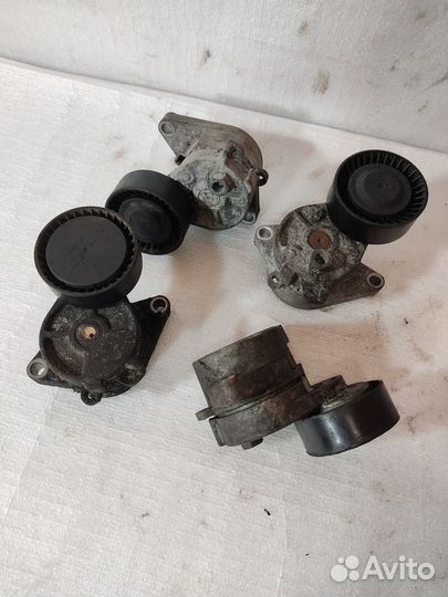 Натяжитель ремня генератора bmw м54