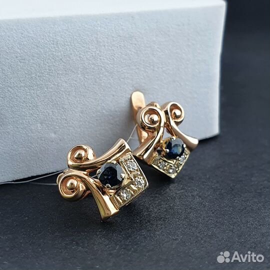 Серьги из комбинированного золота с сапфирами и бр