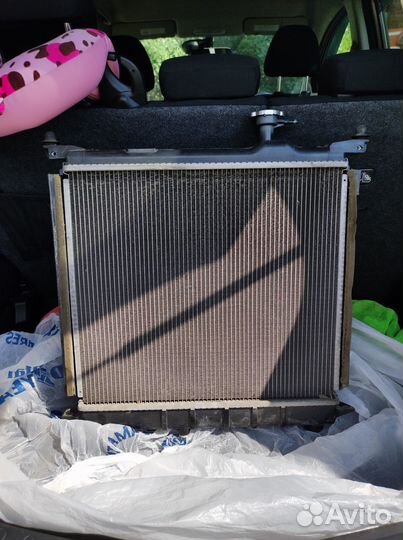 Радиатор кондиционера с вентилятором Nissan Note