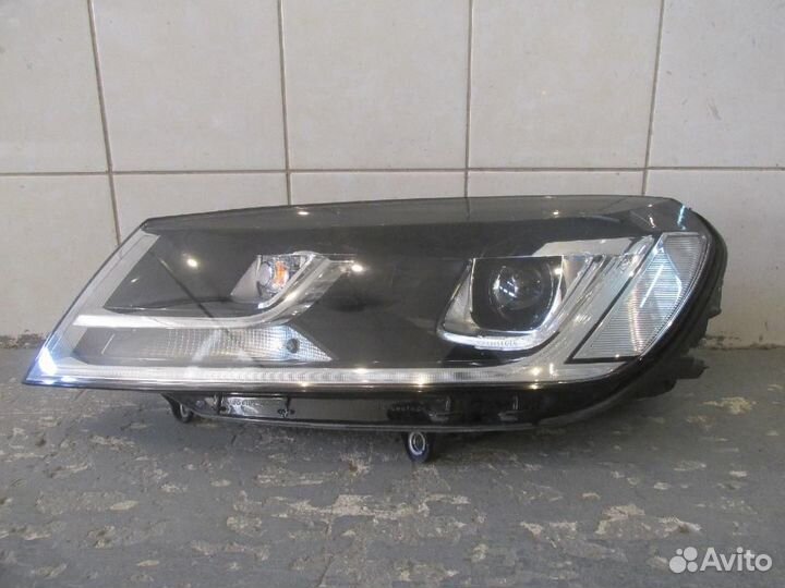 Фара левая Volkswagen Touareg