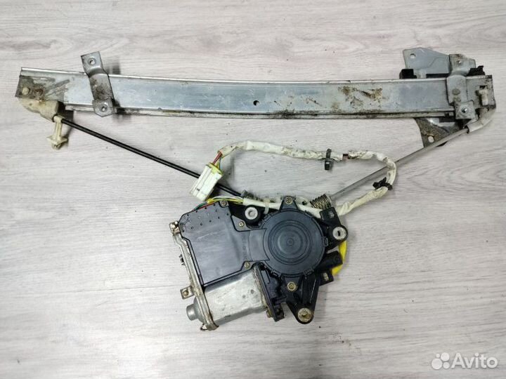 Моторчик стеклоподъемника задний правый Mitsubishi