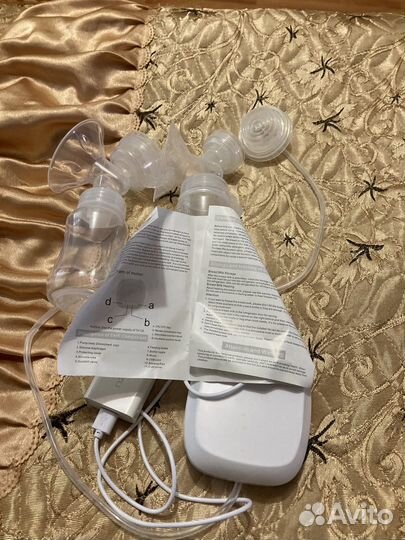 Молокоотсос электрический