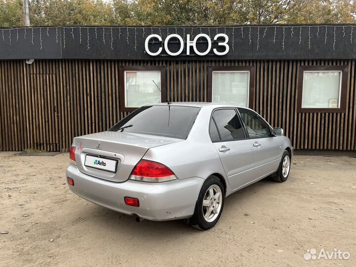 Mitsubishi Lancer 1.6 МТ, 2004, 289 000 км