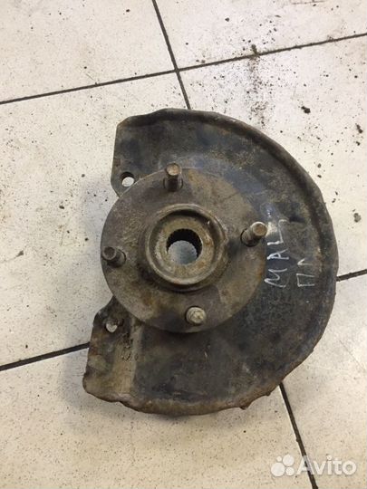 Поворотный кулак передний левый Mitsubishi Lancer