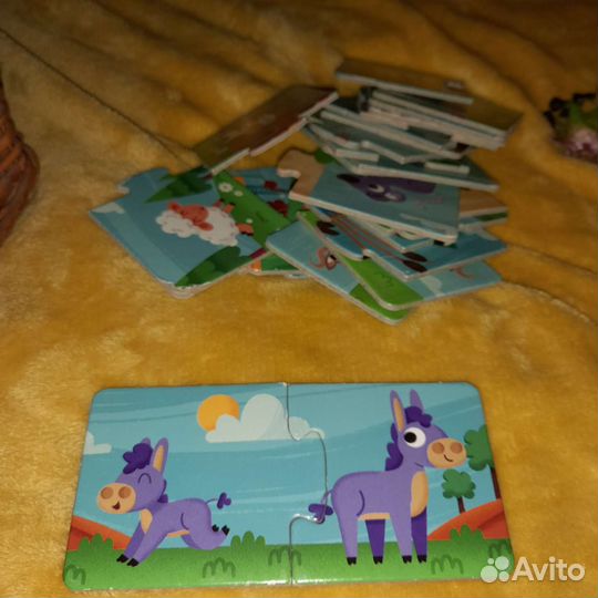 Игрушки погремушки и пазлы для малыша