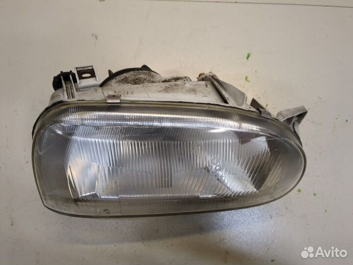 Фара (передняя) Volkswagen Golf 3, 1994