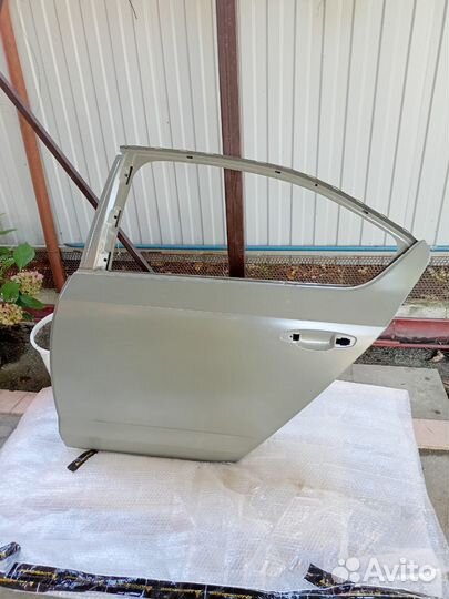 Дверь боковая задняя левая Skoda Octavia A7