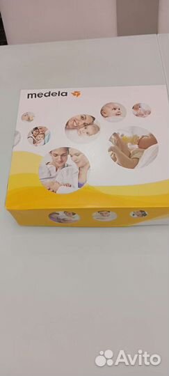 Молокоотсос medela электрический