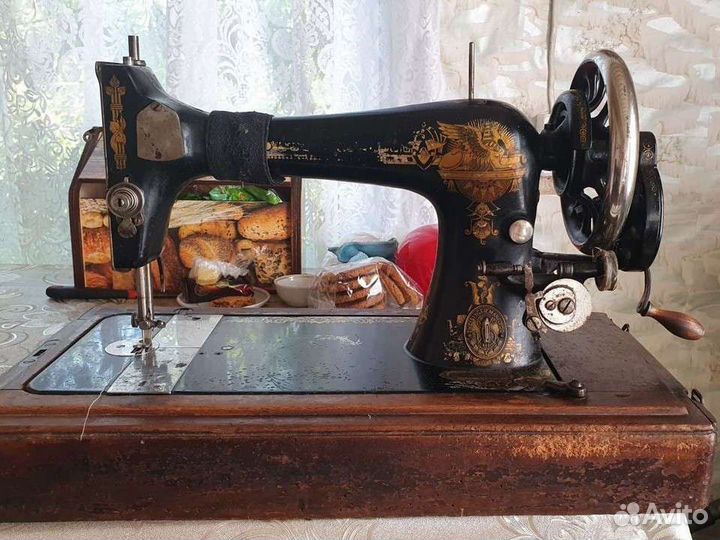 Швейная машинка Зингер
