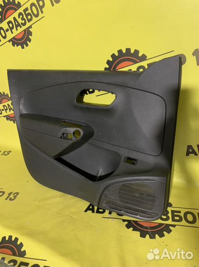 Обшивка двери передняя левая VW polo 5