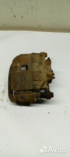 Суппорт передний правый Mazda Familia универсал