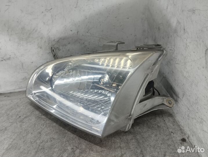 Фара левая KIA Carens 1999-2002 год, оригинал