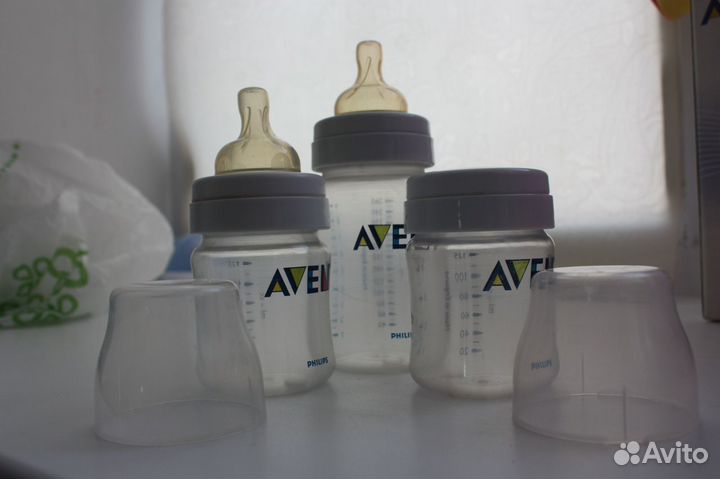 Молокоотсос Avent ручной + 4 бутылочки