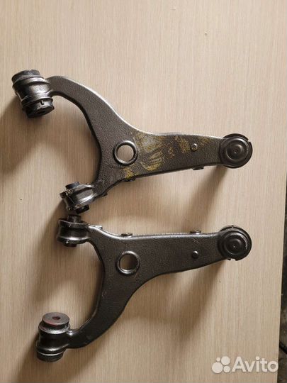 Задние рычаги Субару Форестер
