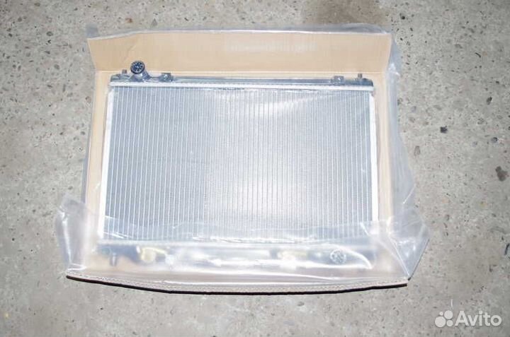 Радиатор двигателя Mazda Demio, Mazda Verisa 02-07