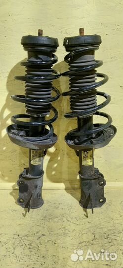 Передние стойки Opel Astra J