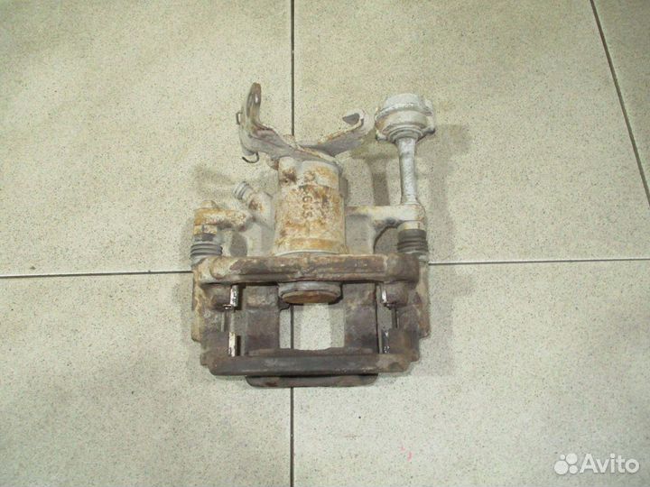 Суппорт задний правый Opel Astra J