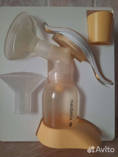 Молокоотсос medela ручной
