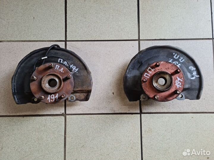 Поворотный кулак передний Mitsubishi Lancer X