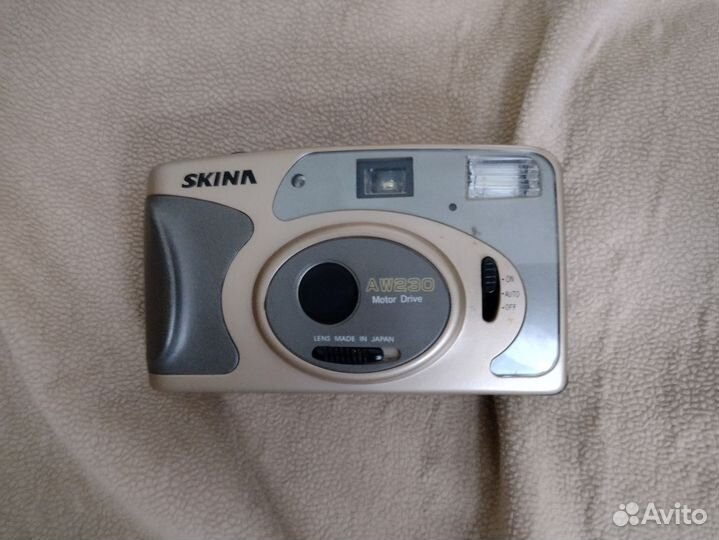 Плёночный фотоаппарат skina AW 230
