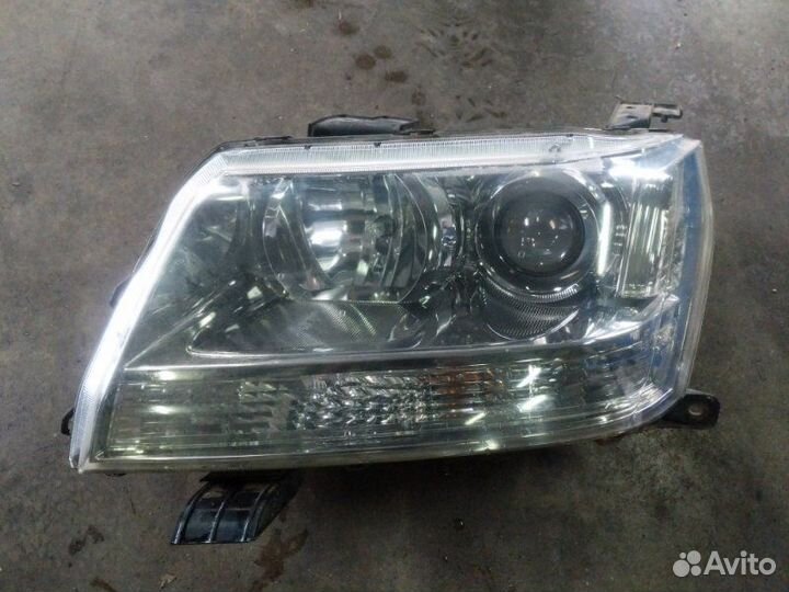 Фара галогеновая передняя левая Suzuki Grand