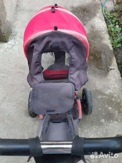 Трехколесный велосипед с ручкой