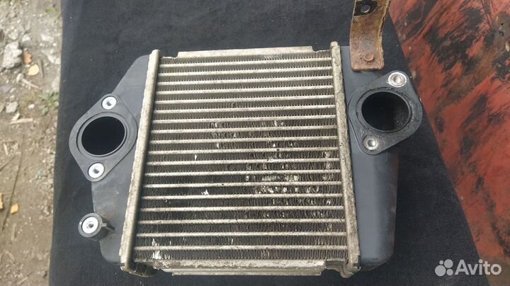 Радиатор интеркуллера Mazda R2AX13565