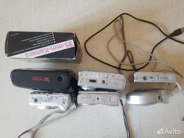 Цифровой фотоаппарат Canon Olympus