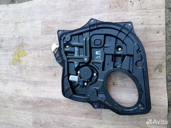 Стеклоподъемник электрический задний правый Mazda