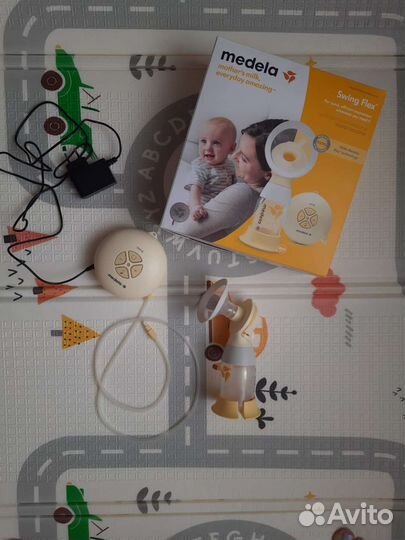 Молокоотсос medela swing flex электрический