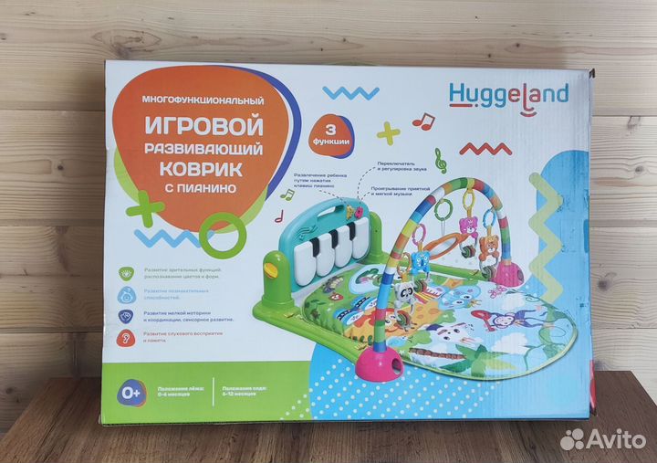 Игровой развивающий коврик с пианино Huggeland